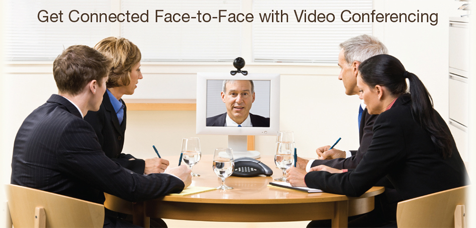 People sitting around the table during video conference